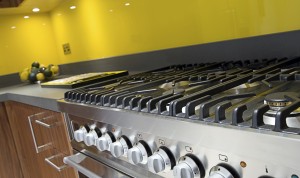 Close Up Shot Across Cooker in Modern Colourful Kitchen